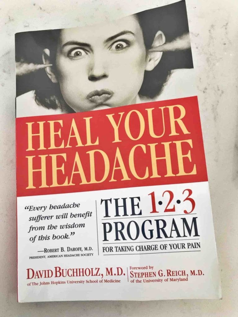 The Heal Your Headache book on a white background