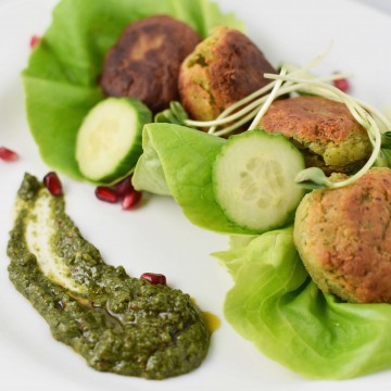 Falafel with cucumber, pomegranate, and zhoug sauce