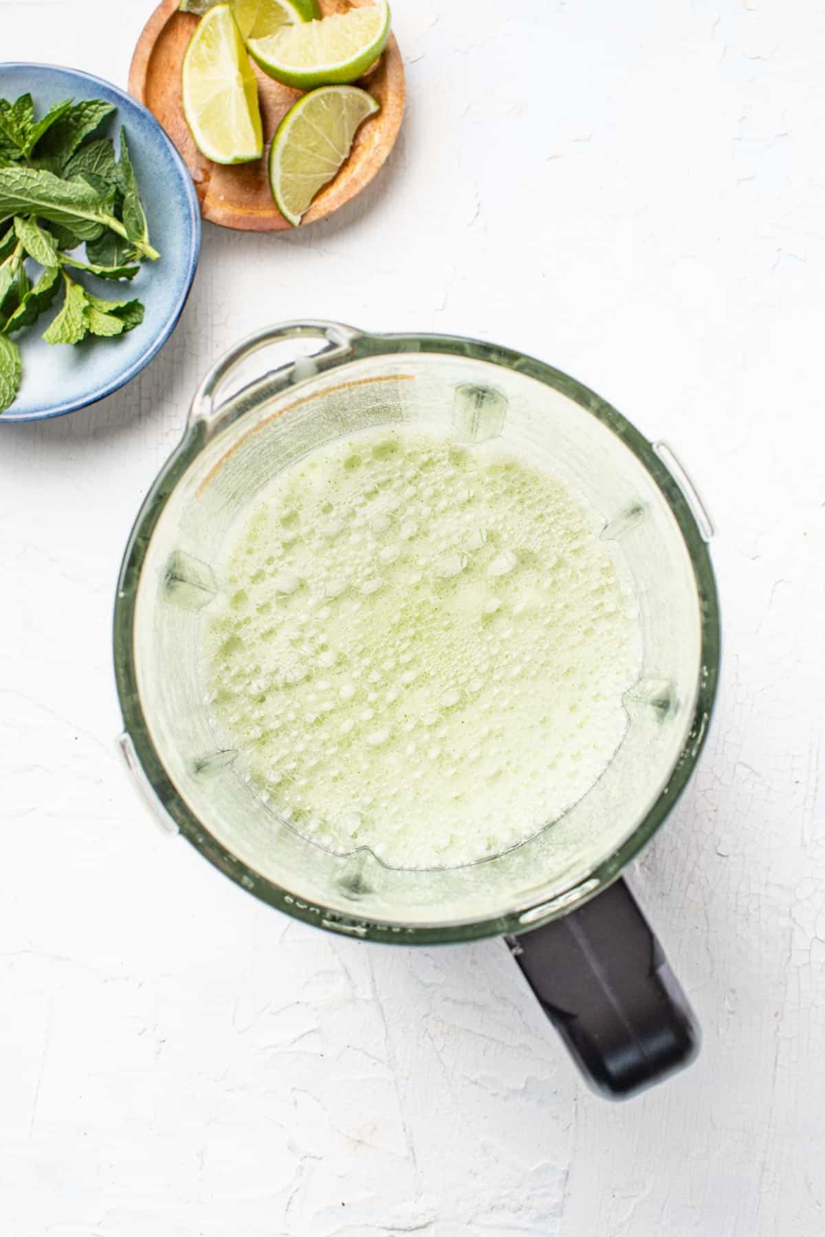 Pear juice after blending all the ingredients together in a mocktail.