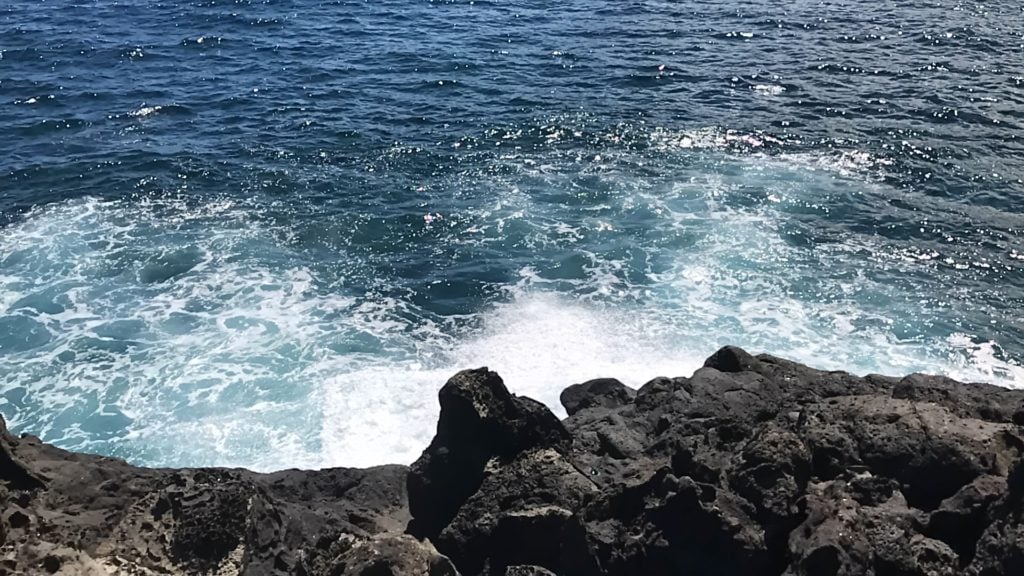 Waves crashing on rocks at a beach