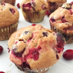 The perfect fall muffin for your Thanksgiving or Christmas breakfast! Light and fluffy, these cranberry pomegranate muffins can be made gluten free. #vegetarian #muffins #fall #cranberry #pomegranate