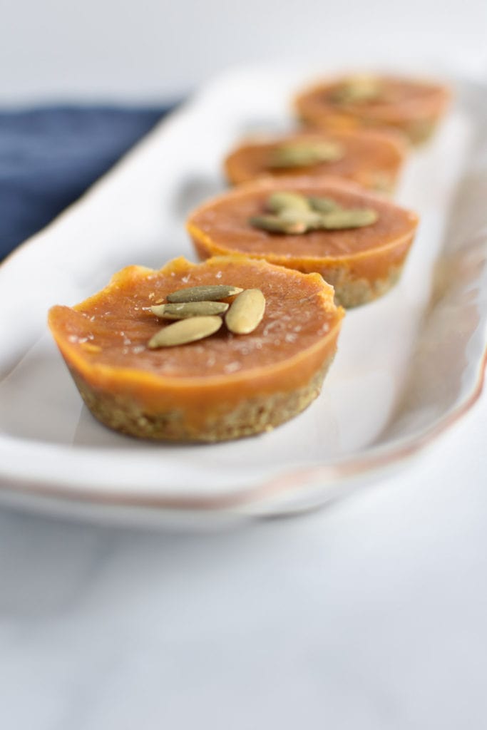 Allergy friendly pumpkin pie bites that are egg free, dairy free, gluten free, and nut free. Perfect for Thanksgiving, these bites are frozen and easy to make. #pumpkinpie #thanksgiving #recipes #paleo #nutfree