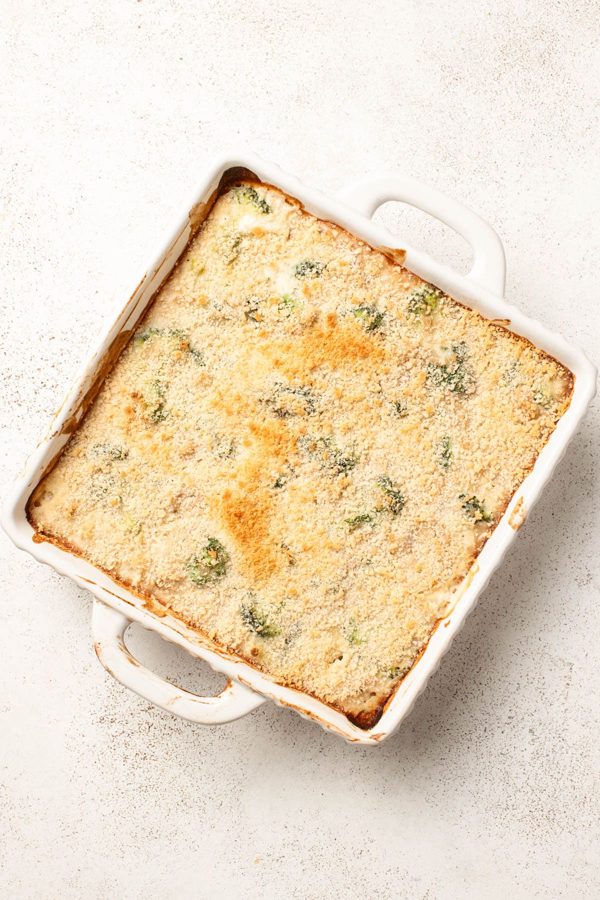 Broccoli rice casserole topped with crispy brown panko.