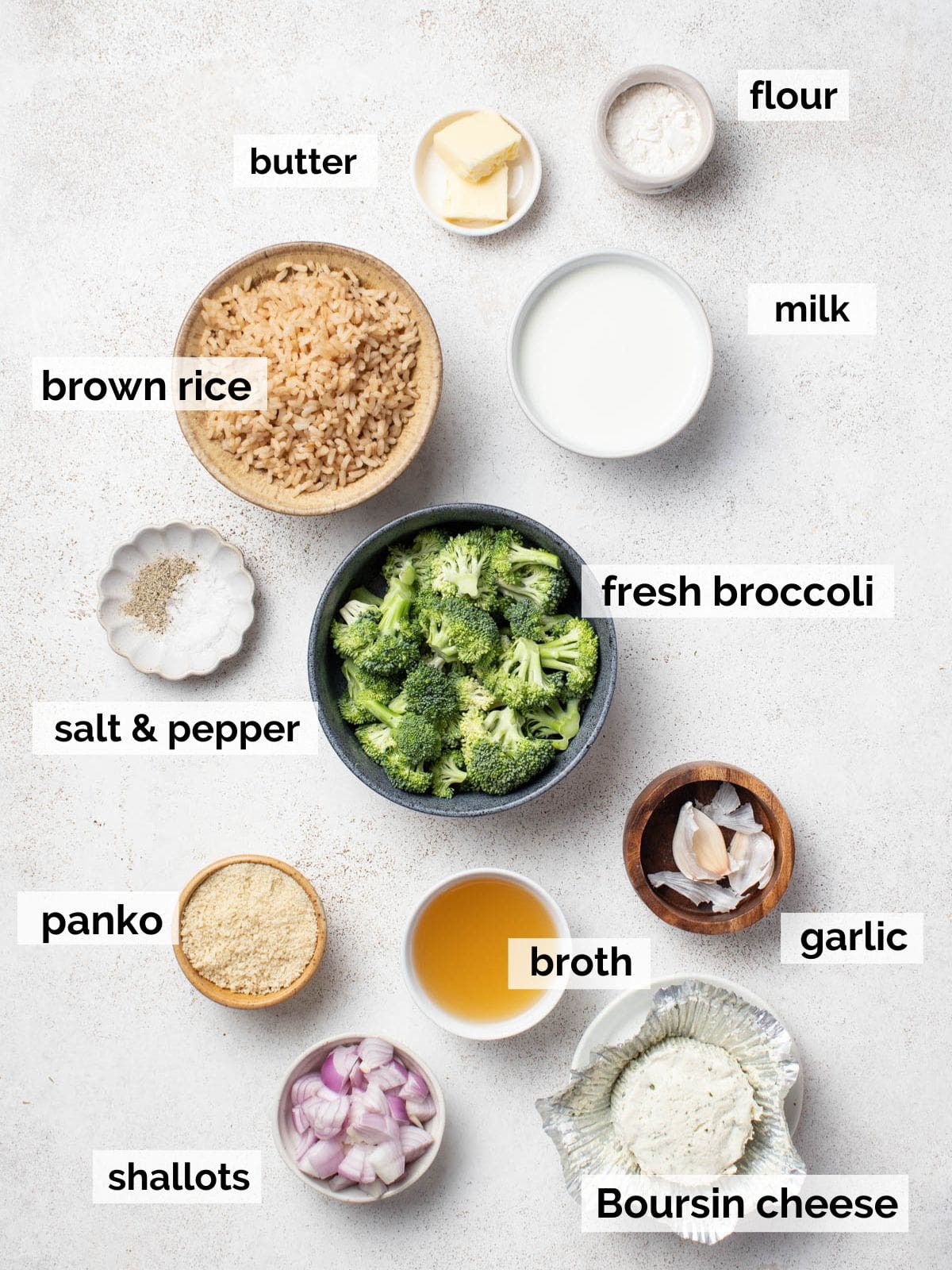 Ingredients for a Boursin cheese broccoli rice casserole with brown rice and fresh broccoli.