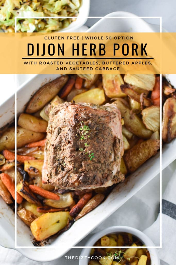 Dijon herb pork loin with roasted root vegetables, buttered apples, and sauteed cabbage is the perfect holiday family dinner. #pork #apples #roastedvegetables