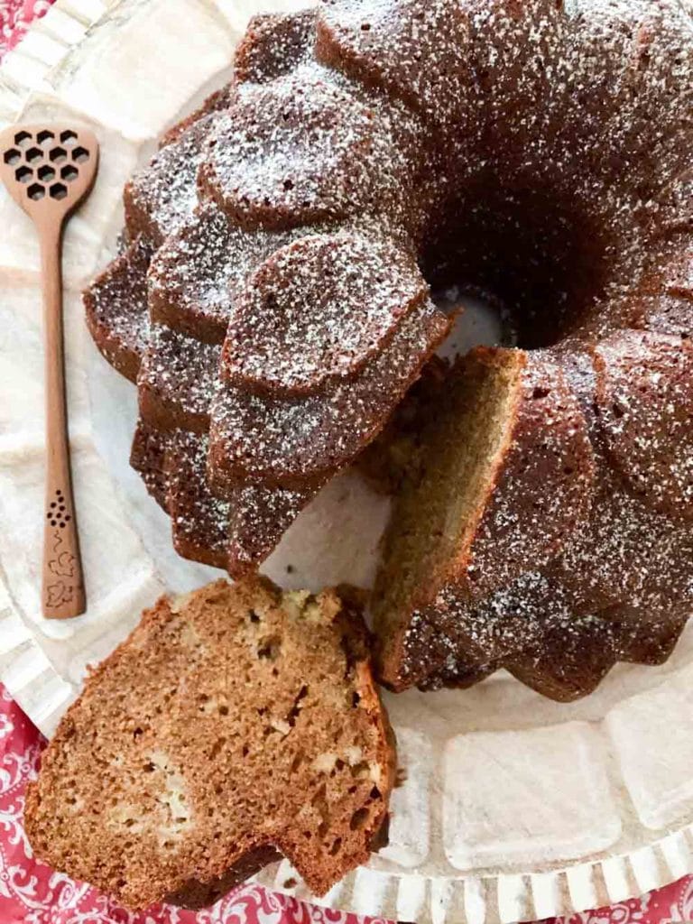 A fresh take on the traditional honey apple cake, this version is spiced with cinnamon, nutmeg, and ginger that pairs beautifully with the honeycrisp or granny smith apples. The perfect bundt cake recipe! #honeyapplecake #bundtcake #cakerecipes #apples