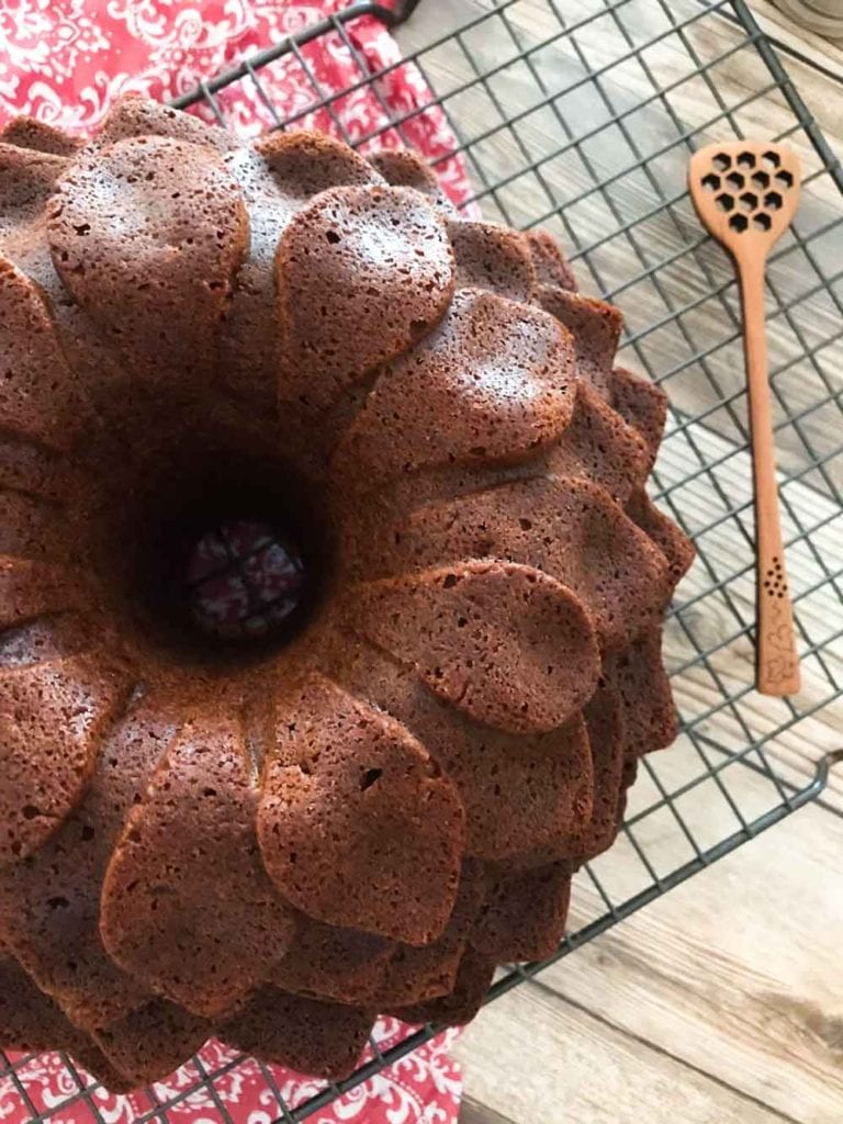 A fresh take on the traditional honey apple cake, this version is spiced with cinnamon, nutmeg, and ginger that pairs beautifully with the honeycrisp or granny smith apples. The perfect bundt cake recipe! #honeyapplecake #bundtcake #cakerecipes #apples