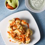 Buffalo cauliflower with faux blue cheese dip is a migraine friendly vegetarian alternative to the traditional game day food. Fresh goat cheese provides a tangy, creamy flavor! #buffalocauliflower #vegetarian #migrainediet