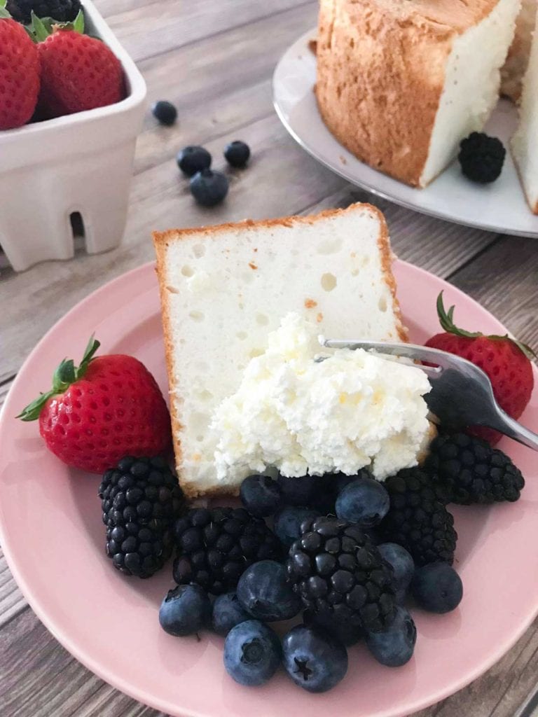 Want to make the perfect Angel Food Cake? This recipe is light, fluffy, and delicious for a dessert you will crave. #angelfoodcake #cake #dessert