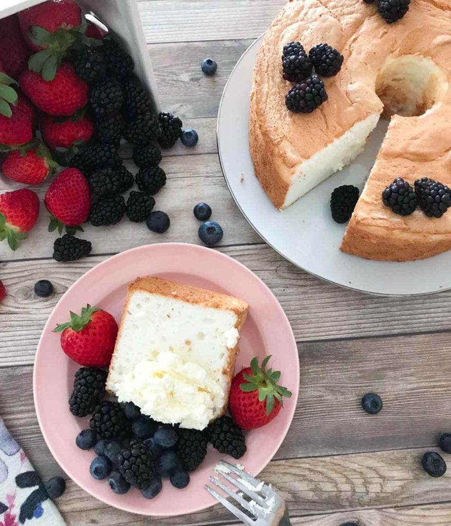 Want to make the perfect Angel Food Cake? This recipe is light, fluffy, and delicious for a dessert you will crave. #angelfoodcake #cake #dessert