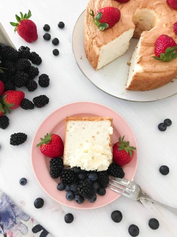 Want to make the perfect Angel Food Cake? This recipe is light, fluffy, and delicious for a dessert you will crave. #angelfoodcake #cake #dessert