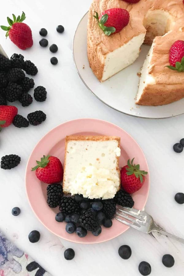 Want to make the perfect Angel Food Cake? This recipe is light, fluffy, and delicious for a dessert you will crave. #angelfoodcake #cake #dessert
