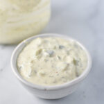 Tartar sauce in a small white bowl
