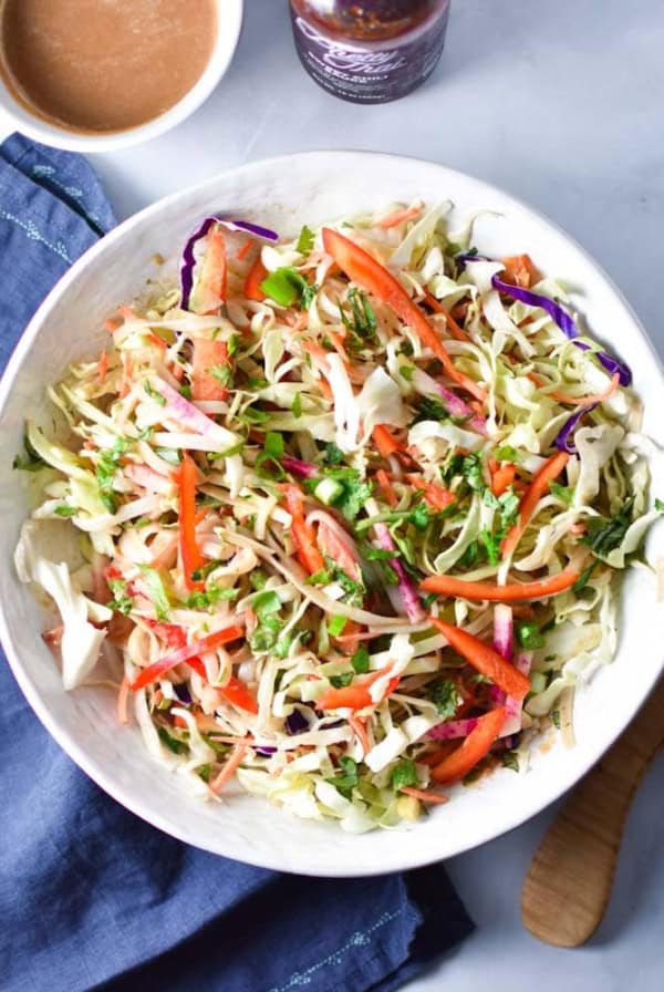 Peanut and nut free, this Thai Vegan Noodle Salad with Sunflower Dressing is the perfect cool salad on a hot day. Loaded with veggies and tossed in a creamy sunflower seed butter sauce, it's a fresh take on takeout. #thainoodle #peanutfree #soyfree #allergyfriendly