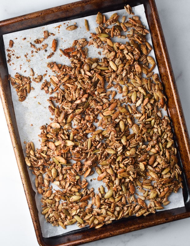 Toasted seed granola on a sheet pan