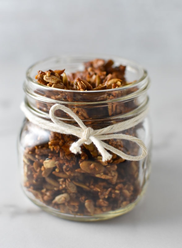 Paleo granola in a mason jar with a twine bow