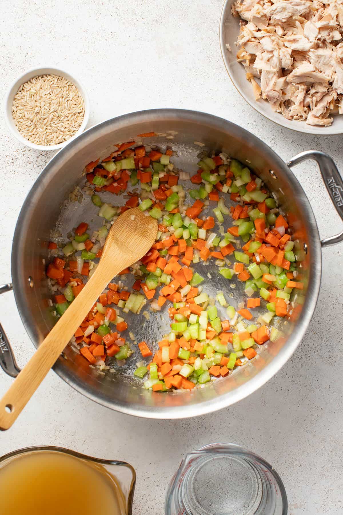 Cooking vegetables in a soup pot.