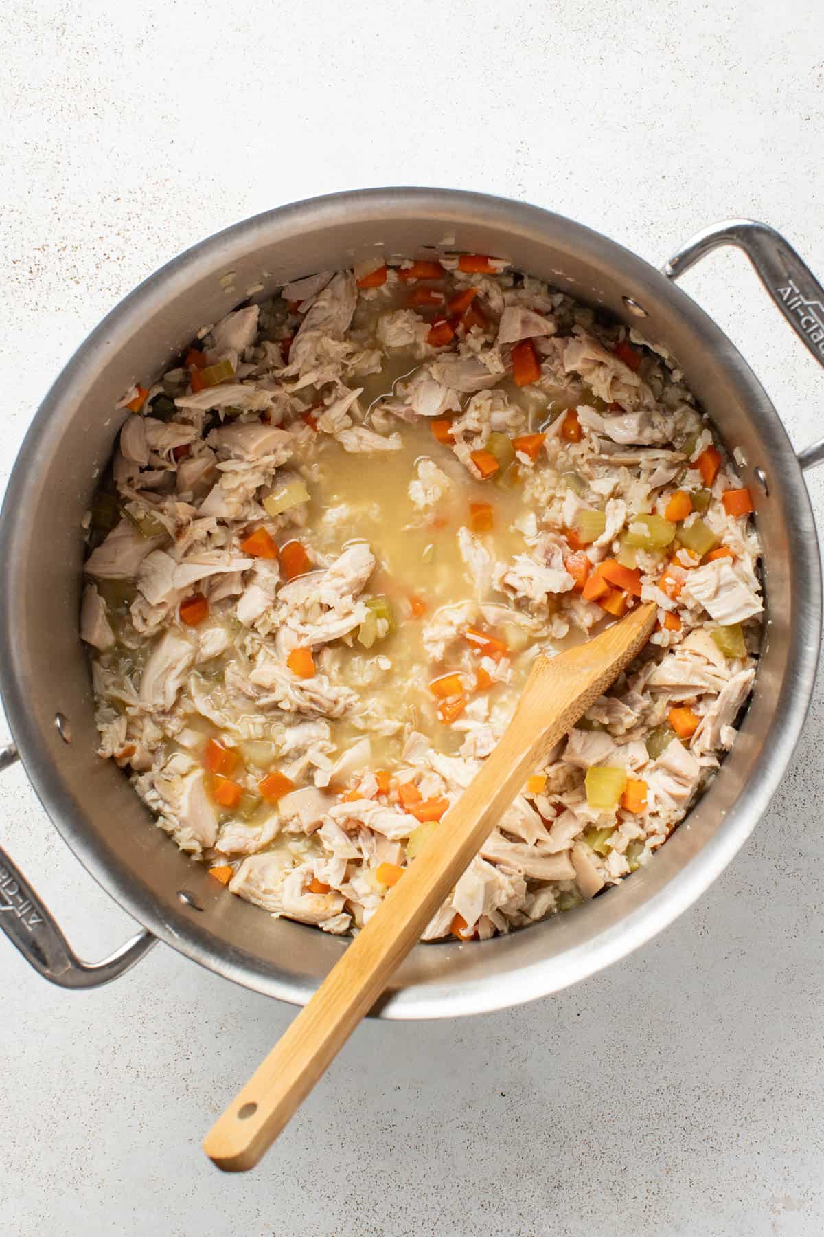 Chicken soup after the rice has cooked through.