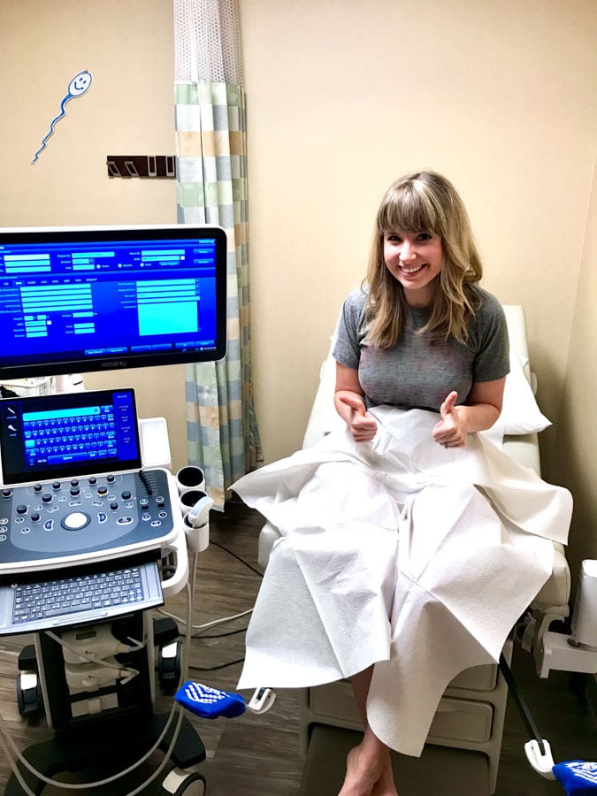 a woman in an ultrasound exam room