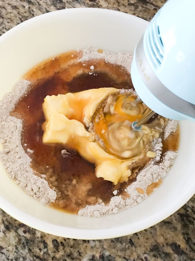 mixing dough for spiced honey cookies