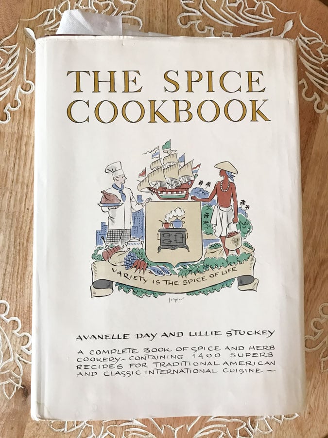 the spice cookbook on a kitchen counter