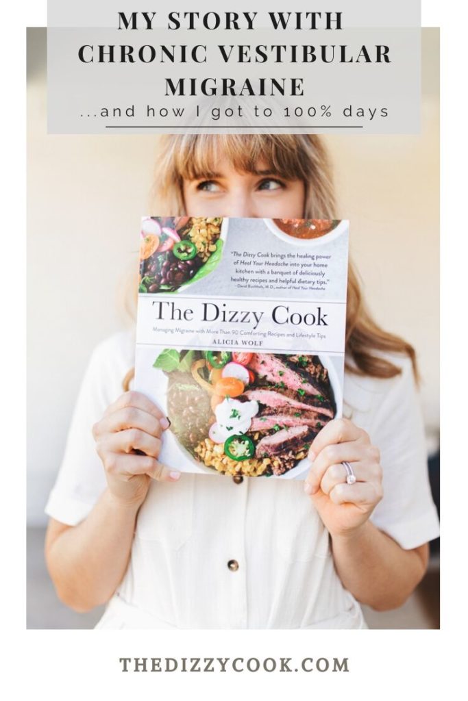 A girl holding The Dizzy Cook Cookbook