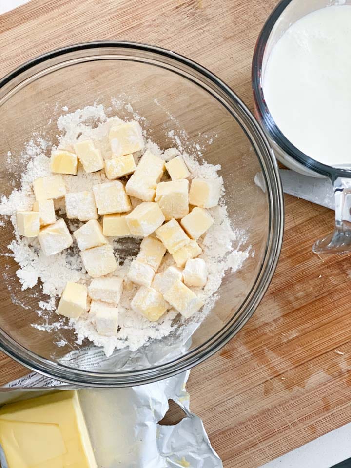 Ingredients for drop biscuits without buttermilk on a wooden board