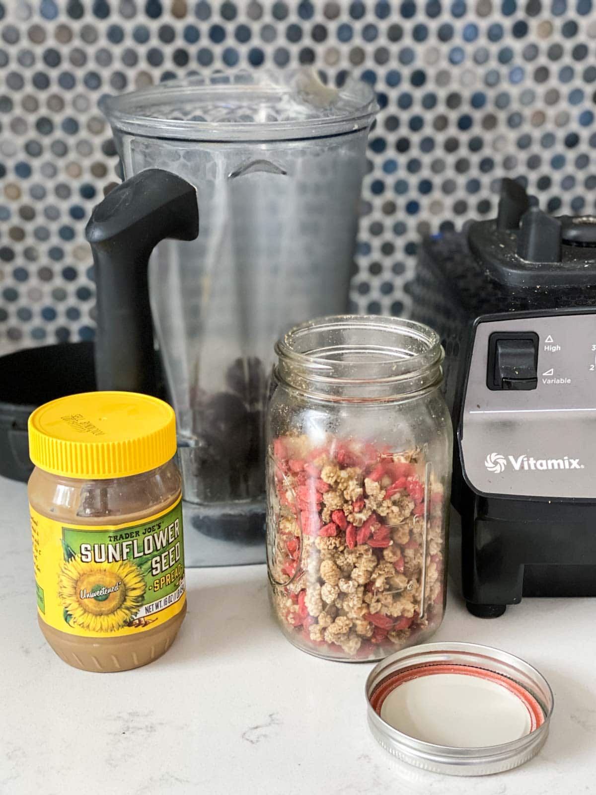 Ingredients for a cherry smoothie on a table.