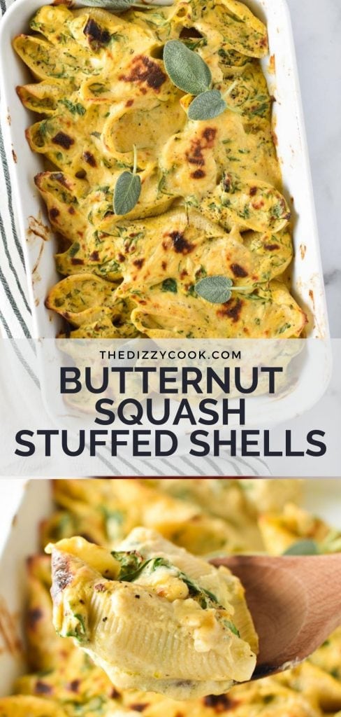 Baked butternut squash stuffed shells in a white baking dish next to a striped towel