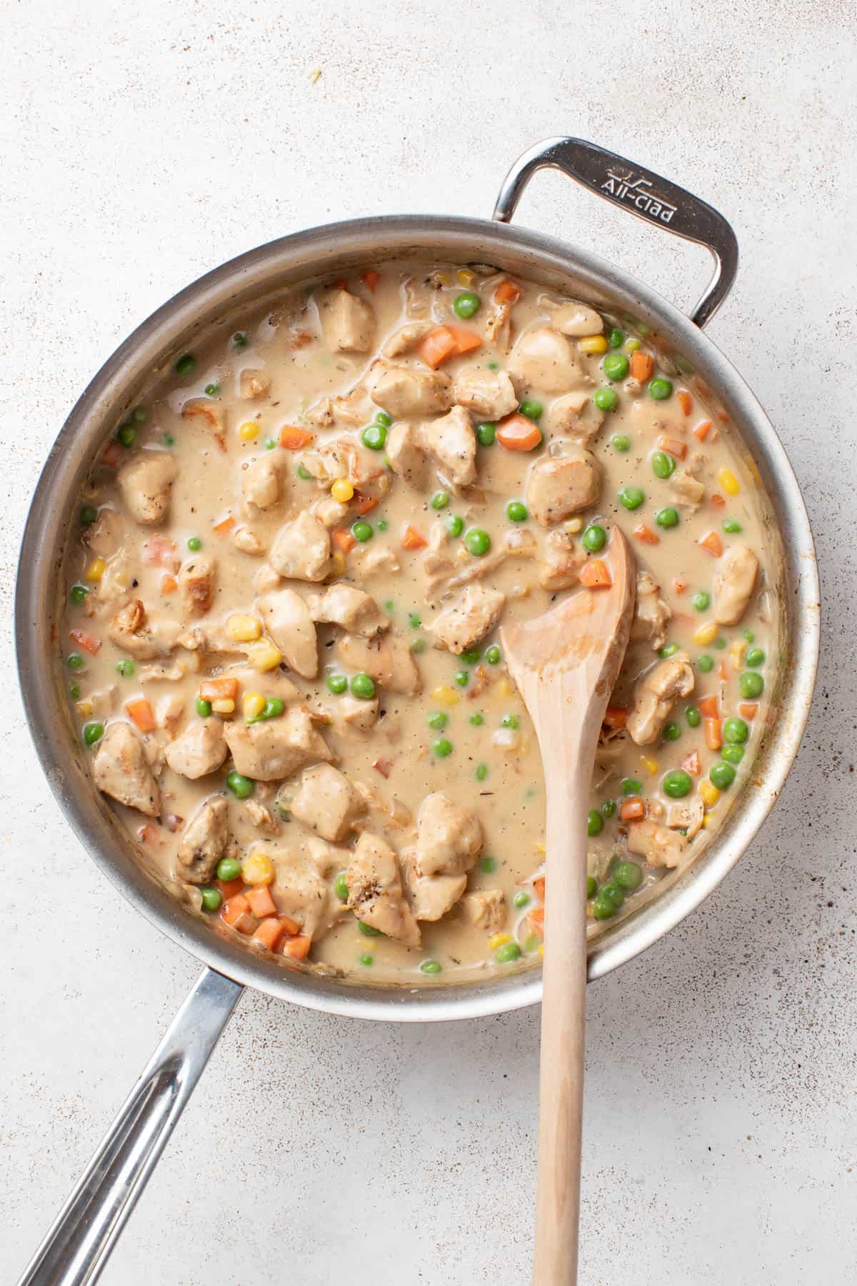 Chicken pot pie filling after being cooked with the veggies and milk.