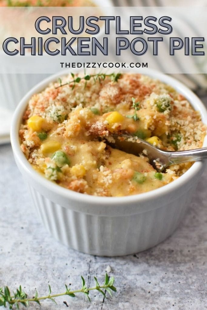 A spoon with lots of crustless chicken pot pie filling on it