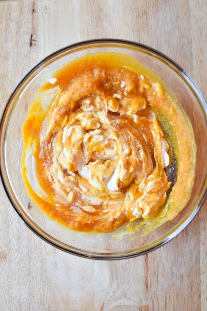 A swirled mixture of butternut squash and ricotta cheese in a bowl