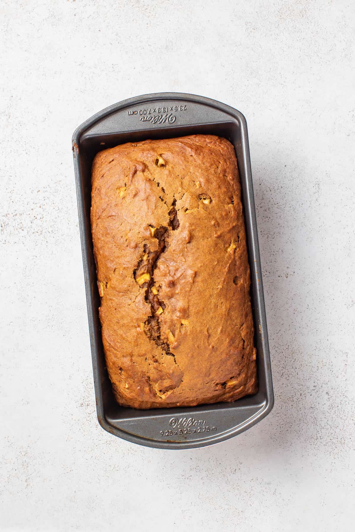 Pumpkin bread after baking in a loaf pan.