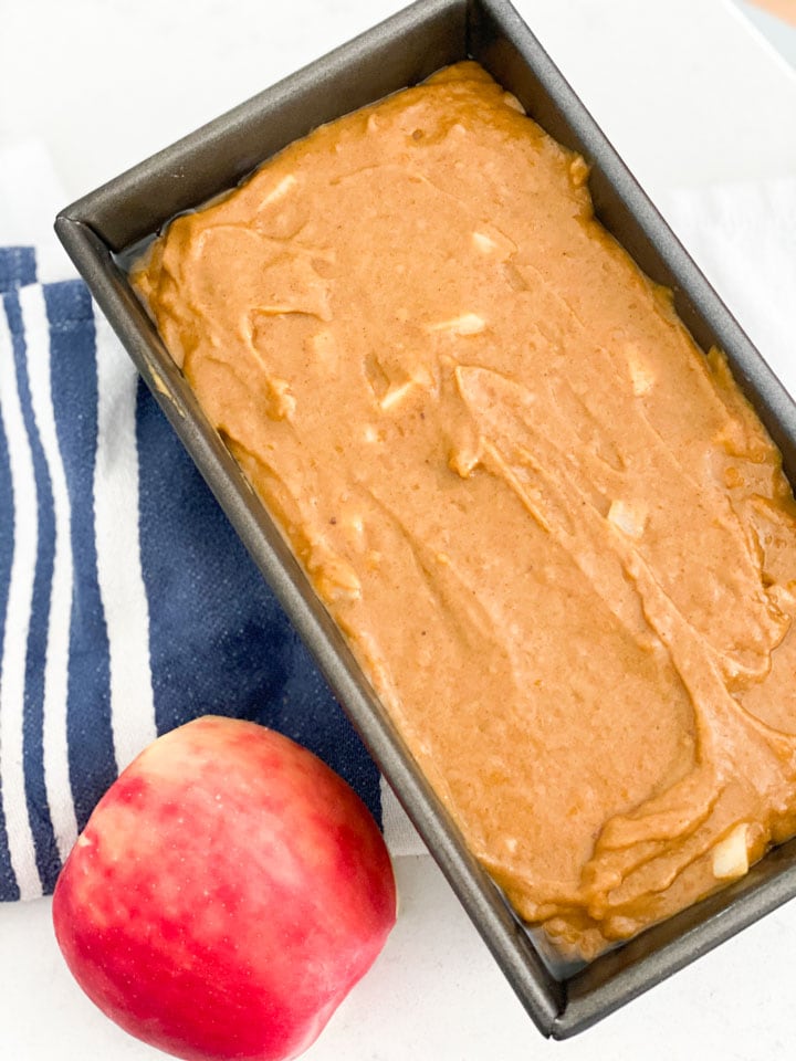 Uncooked pumpkin bread in a loaf pan