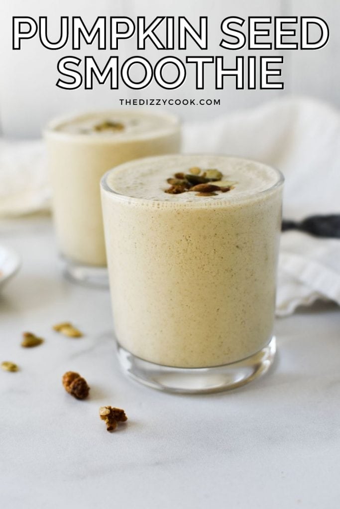 Two pumpkin seed smoothies topped with toasted pumpkin seeds and mulberries