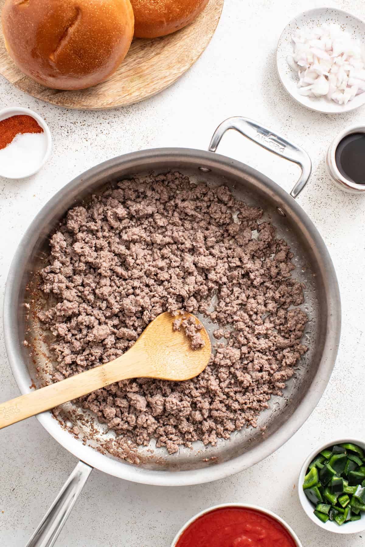 Browning ground beef in a pan.