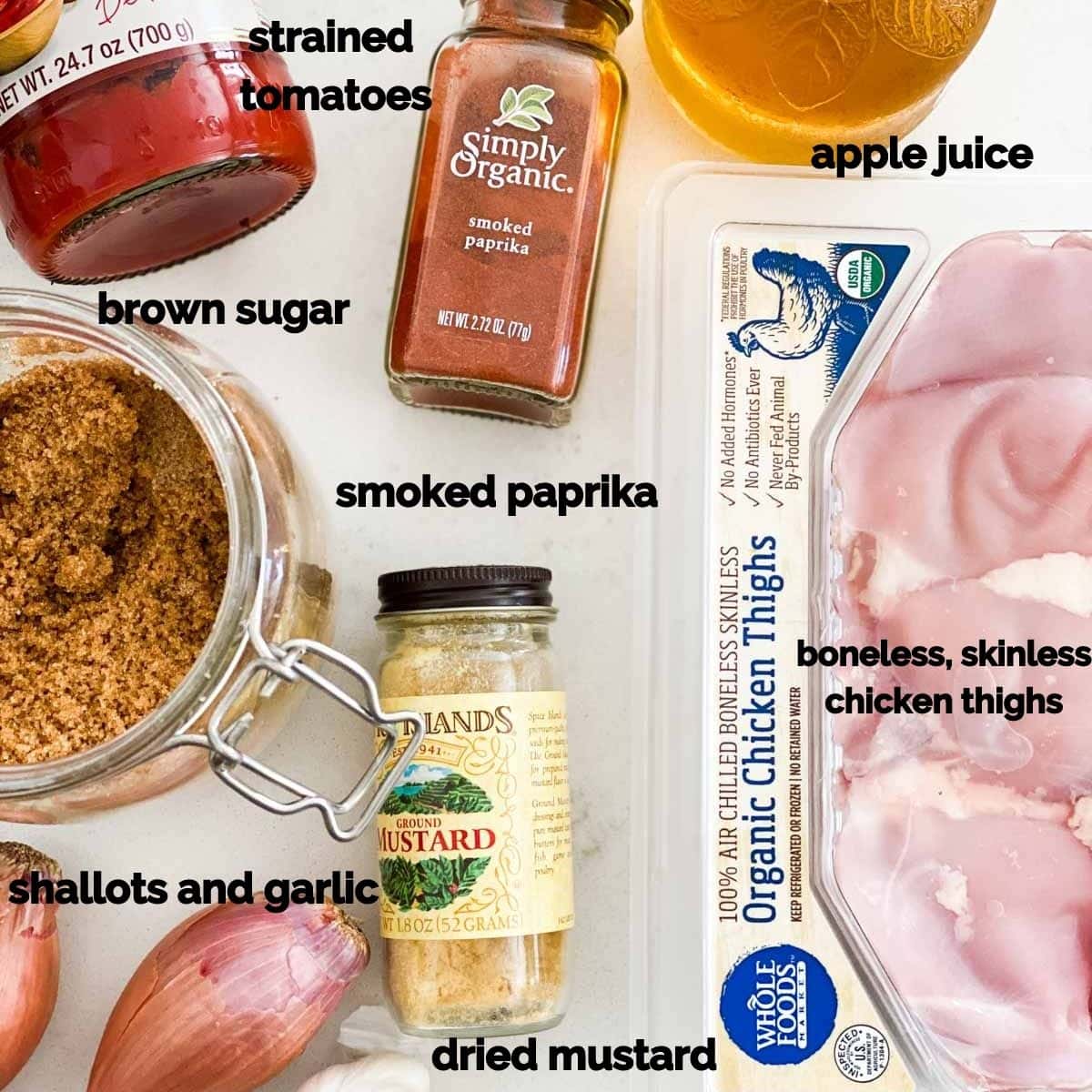 Spices and ingredients for slow cooker bbq chicken laid on a table