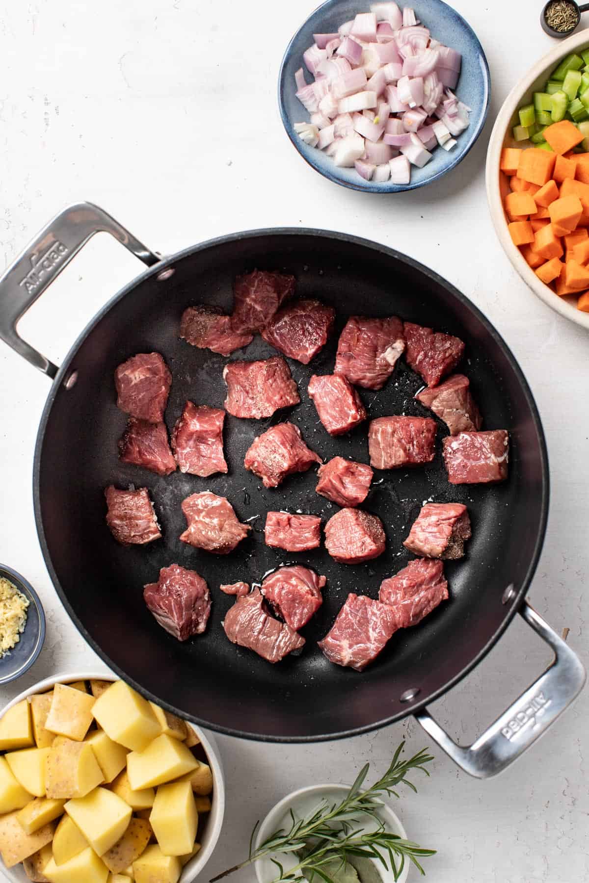 Beef chuck roast in a large pot.