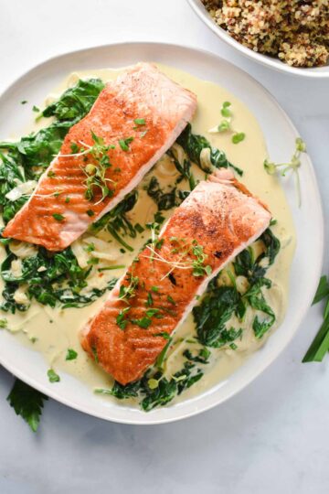 Salmon with Spinach Cream Sauce - The Dizzy Cook