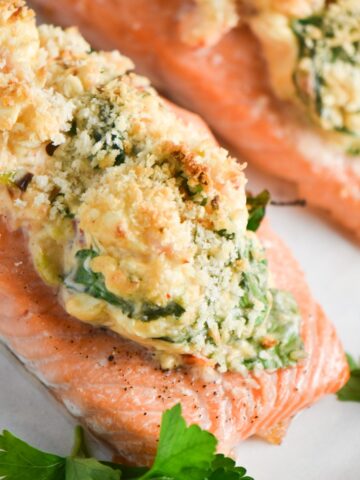 A fillet of salmon stuffed with shrimp, spinach, and cheese, topped with panko.