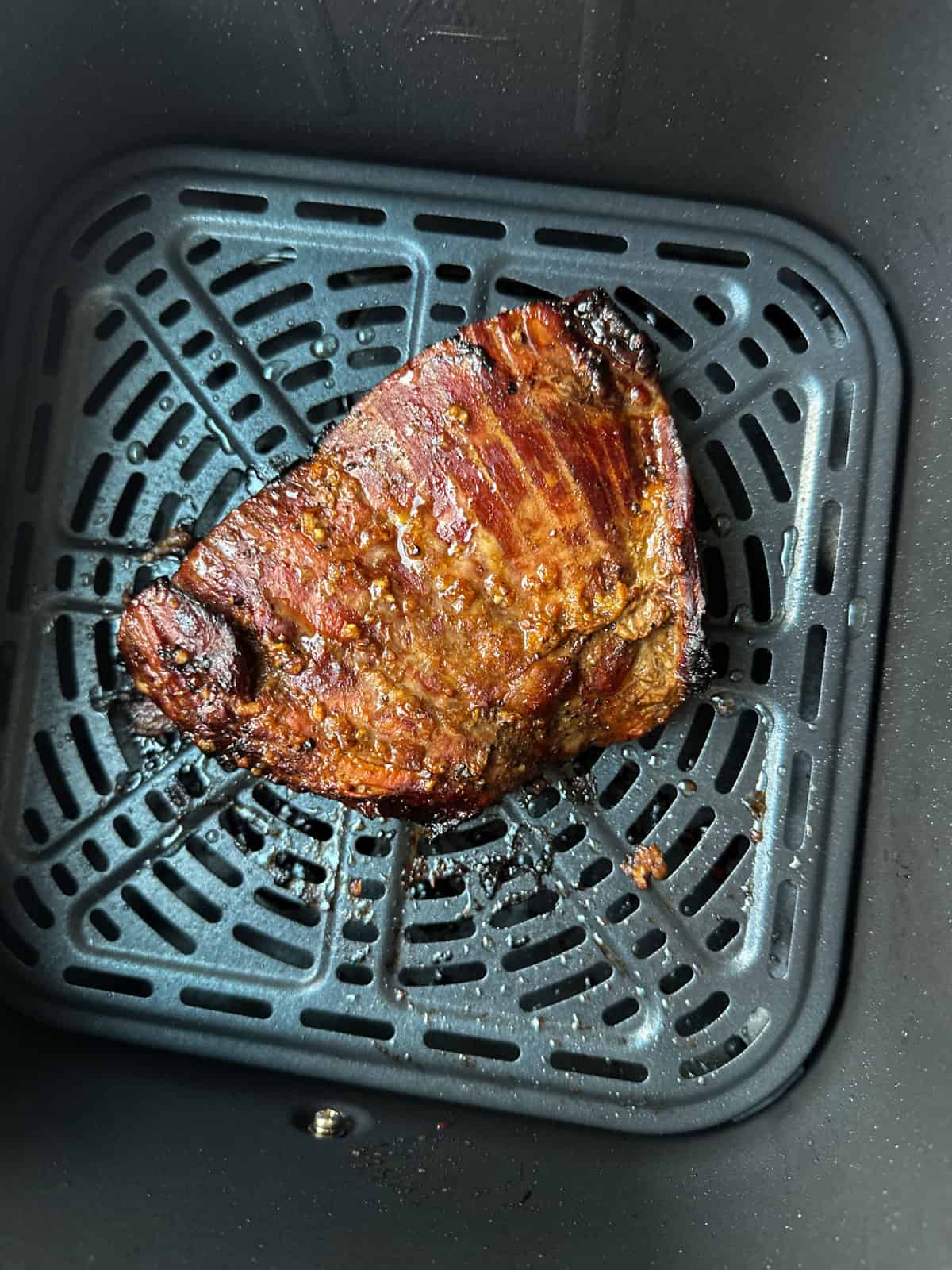 Flank steak after being cooked in the air fryer.
