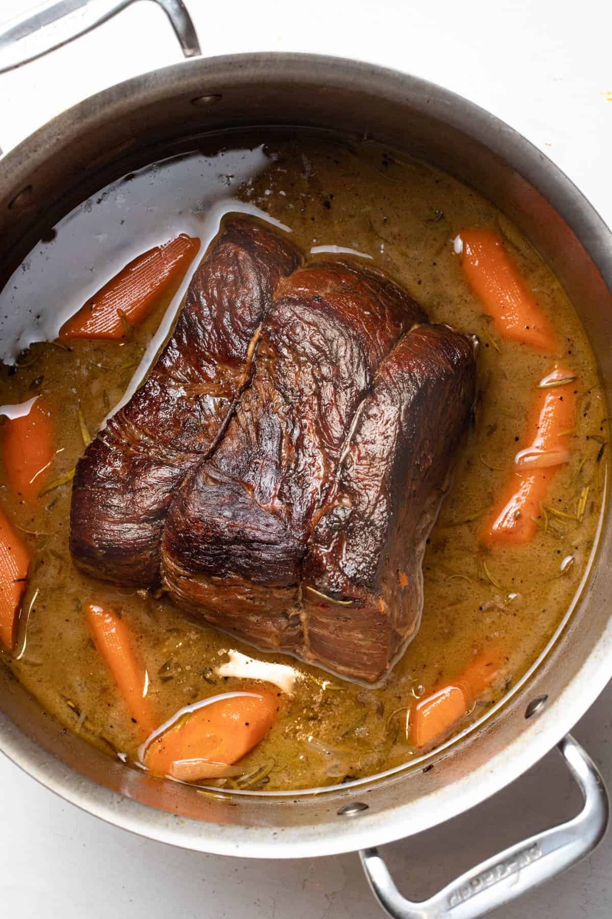 The boneless chuck roast after being cooked in the dutch oven for 3 hours.