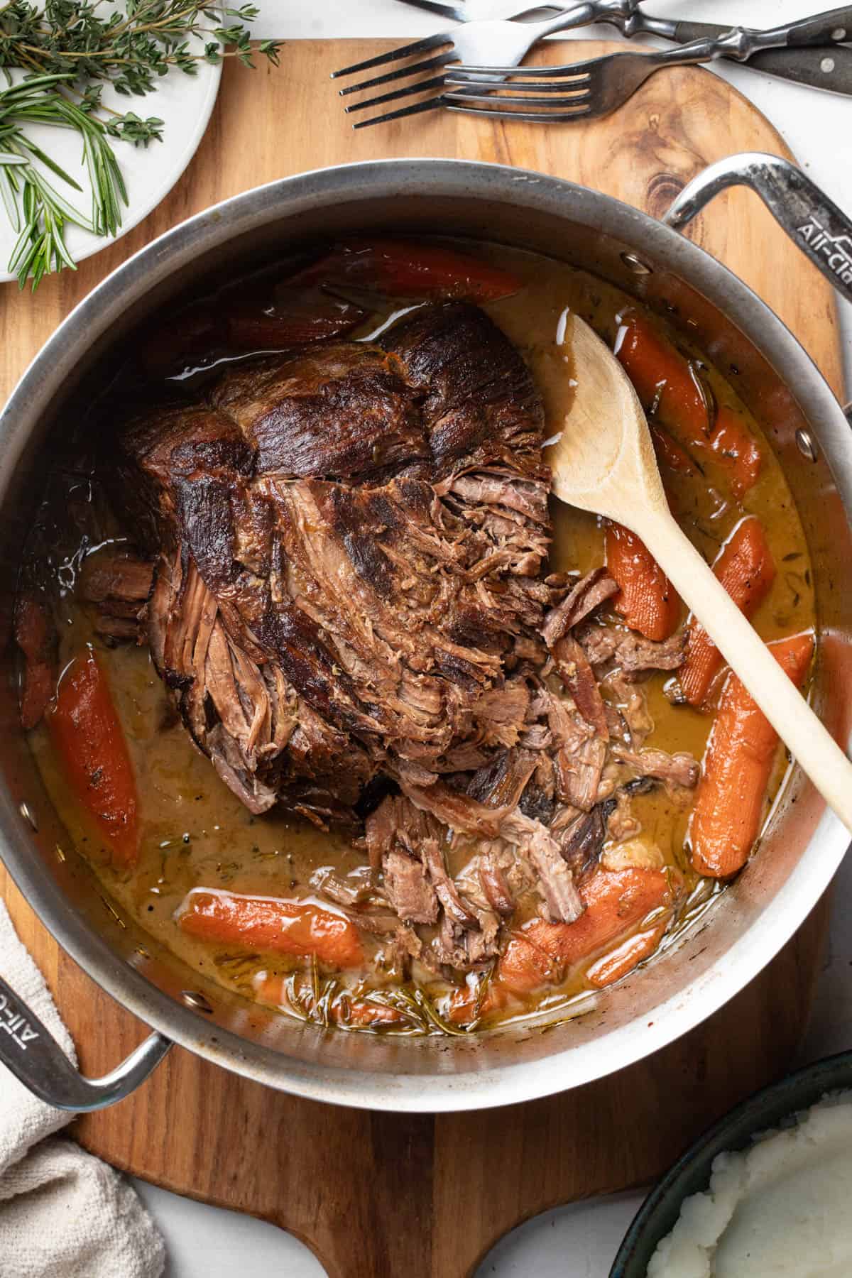Pot roast in the dutch oven after cooking in the oven.
