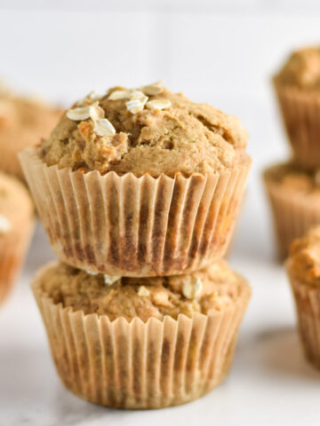 Banana applesauce muffins topped with oats.