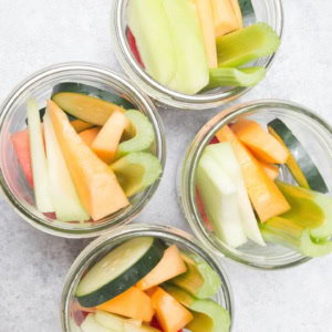 4 jars of cut melon and cucumber.