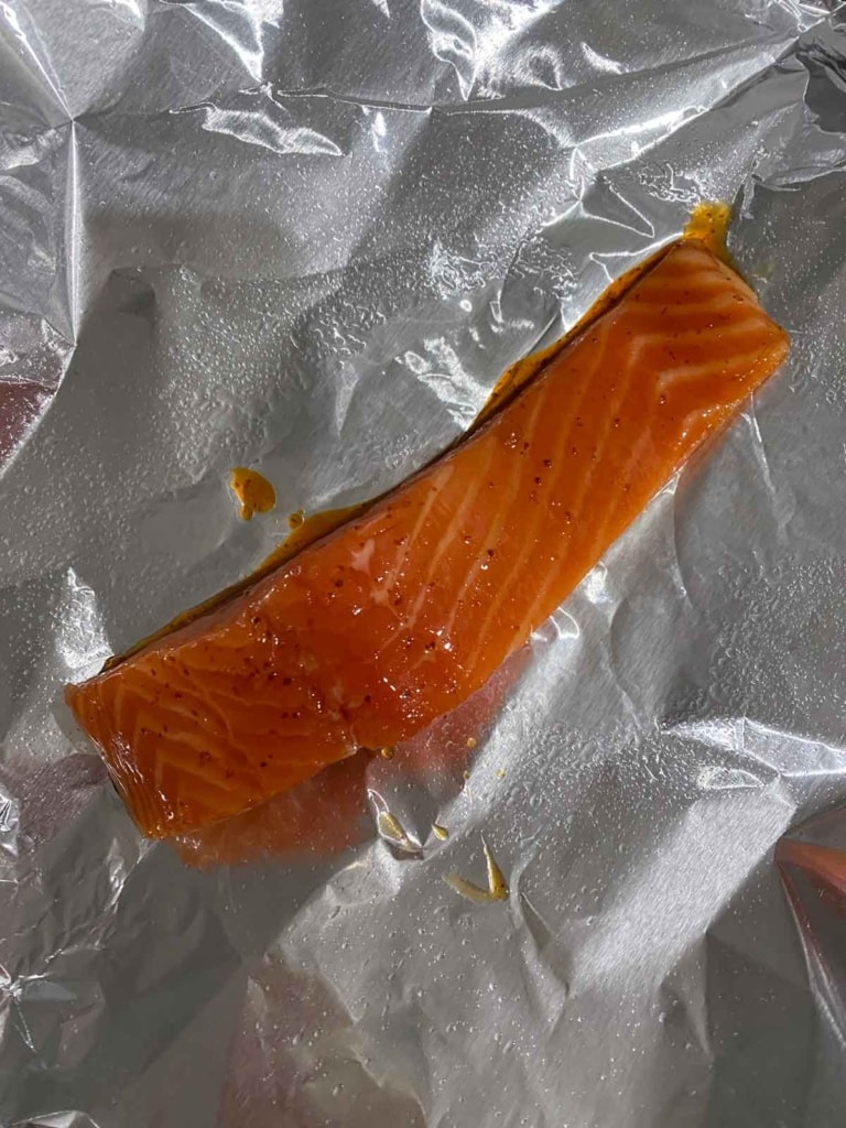 Salmon on a sheet of tin foil.