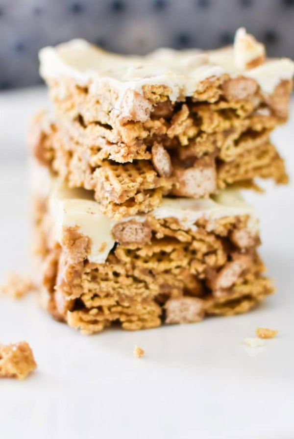 Two stacked crispy cereal bars on a plate.