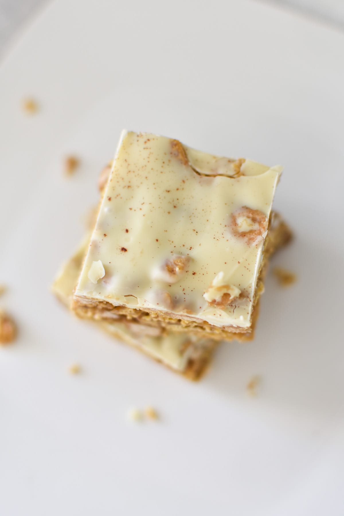 White chocolate cereal bar on a plate.