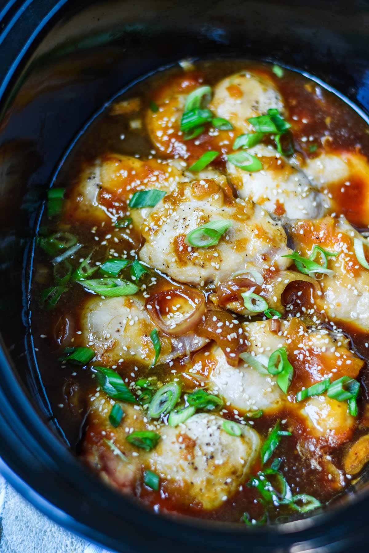 Chicken with shallots and apricot jam in a crock pot.