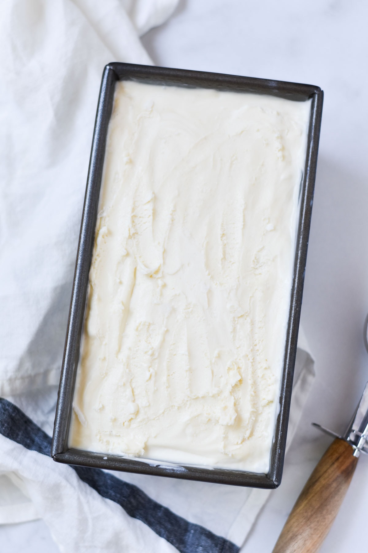 A frozen container of no churn ice cream.